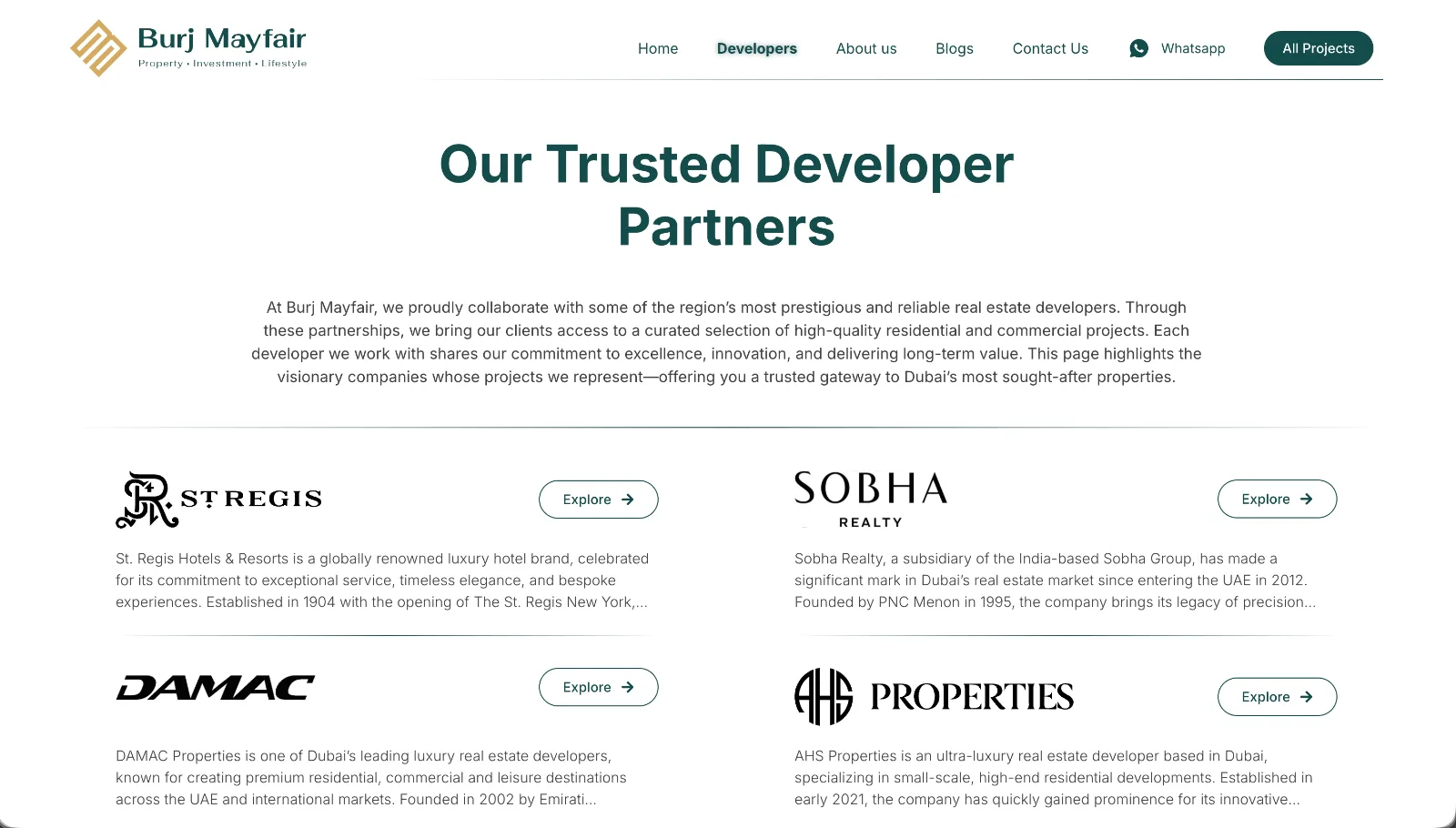 The Burj Mayfair developer partners page, showing the St. Regis, Sobha, DAMAC and AHS logos